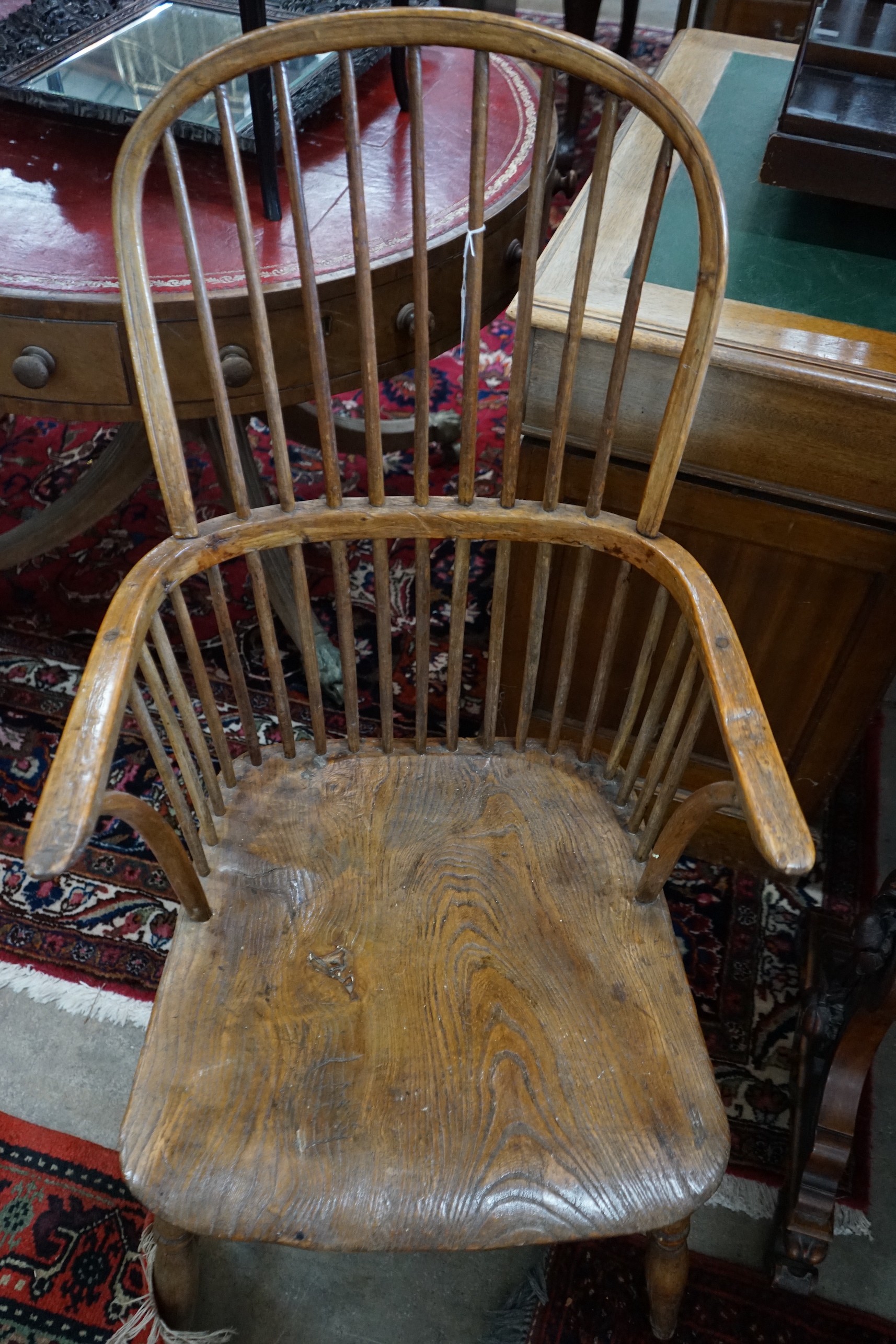 A 19th century ash and elm Windsor comb back armchair, width 54cm, depth 50cm, height 105cm